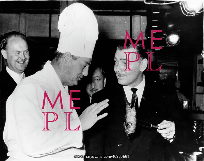 : Clark Gable, American actor, chats with a chef : Clark Gable, American actor, chats with a chef