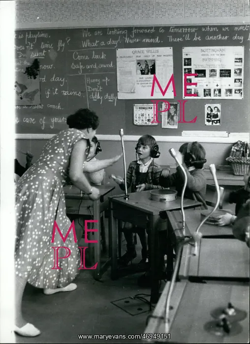 : Classroom scene with teacher and pupils : Classroom scene with teacher and pupils