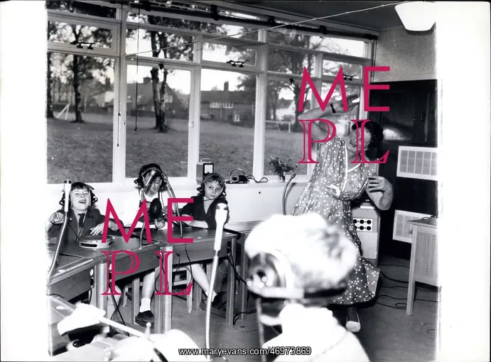: Classroom scene with teacher and pupils : Classroom scene with teacher and pupils