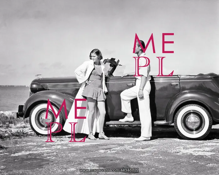  : Classy Couple Standing by Convertible Car on Beach