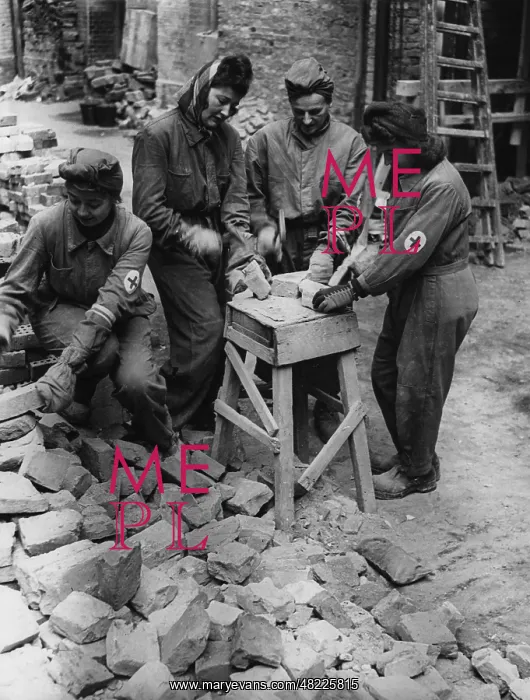 : Cleaning up after an air raid, 1944 : Cleaning up after an air raid, 1944