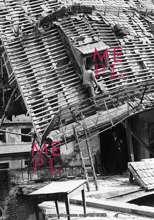 : Cleaning up after an air raid : Cleaning up after an air raid