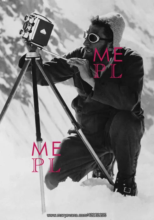 : Climber with film camera : Climber with film camera