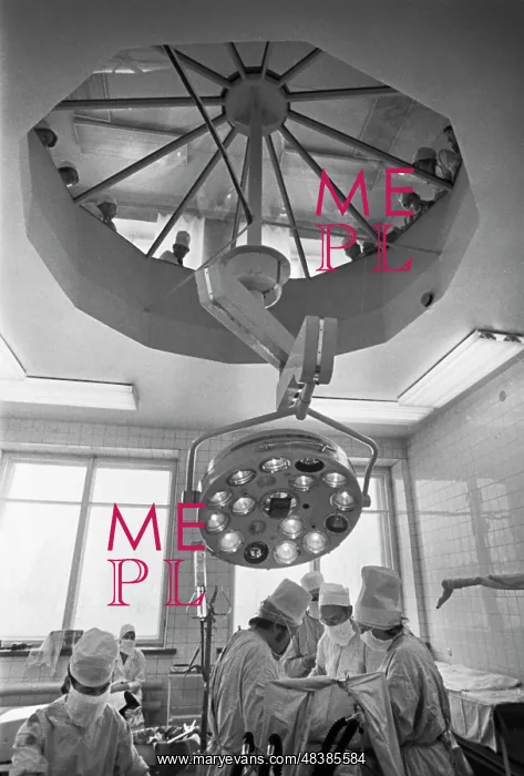 : Clinic. USSR. December 1, 1980. Surgeons operate a patient using a laser scalpel : Clinic. USSR. December 1, 1980. Surgeons operate a patient using a laser scalpel
