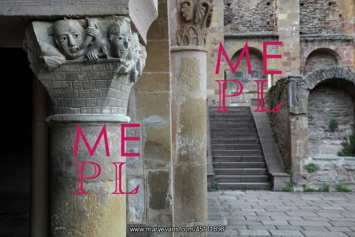 : Cloister capital with monks building, Abbatiale : Cloister capital with monks building, Abbatiale