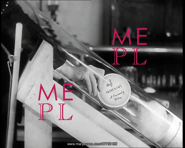  : Close Up of a British Man Inserting A Pathe