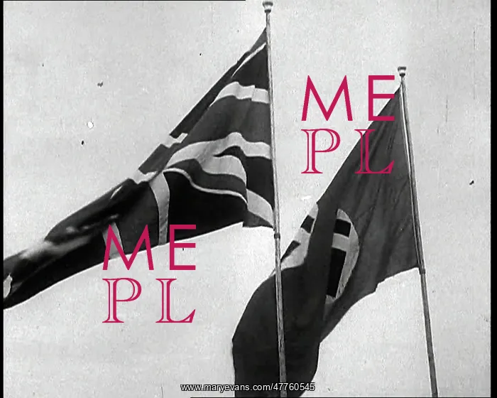 : A Close Up of a German and British Flag Flying : A Close Up of a German and British Flag Flying