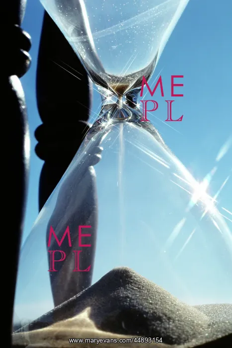 : Close-Up Sand Falling Through Hourglass