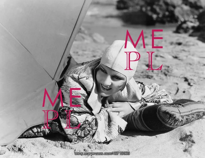: Closeup of woman lying on sand : Closeup of woman lying on sand