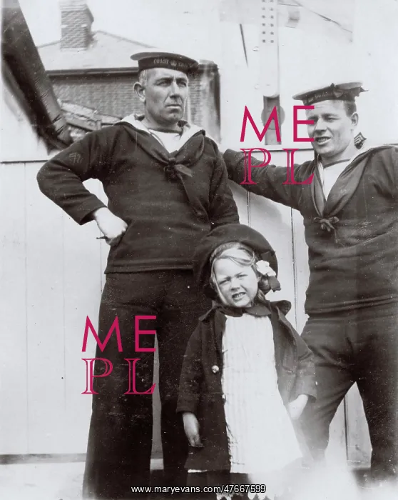 : Two coastguards and a little girl : Two coastguards and a little girl