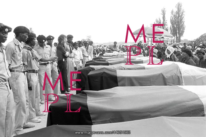  : Coffins at a mass funeral in Alexandra. The deaths