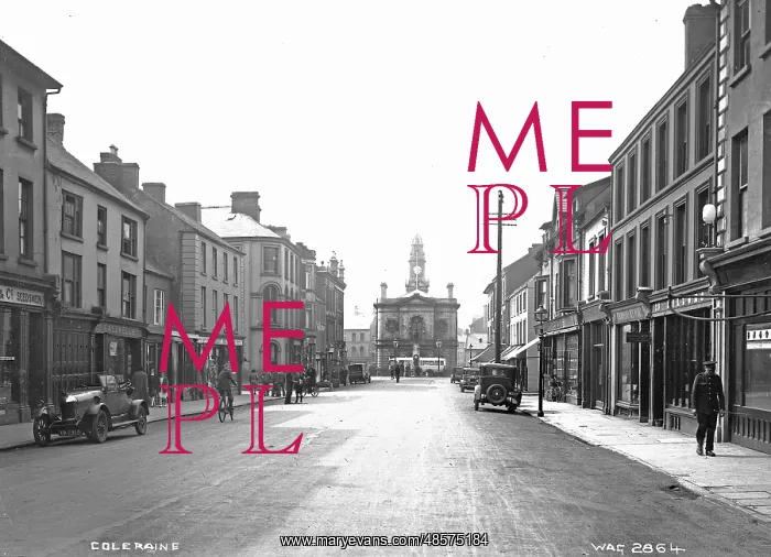 : Coleraine - a busy street scene with shop fronts, motor cars, people : Coleraine - a busy street scene with shop fronts, motor cars, people