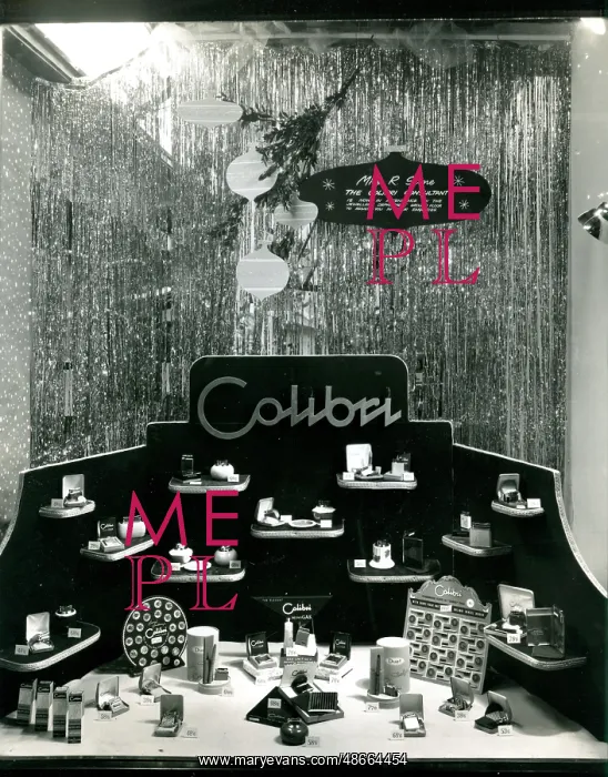 : Colibri cigarette lighter and cigarette case window display : Colibri cigarette lighter and cigarette case window display
