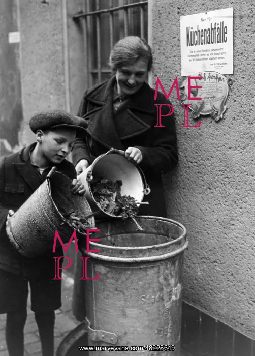 : Collecting kitchen waste for a piggery of the NSV in Ber : Collecting kitchen waste for a piggery of the NSV in Ber