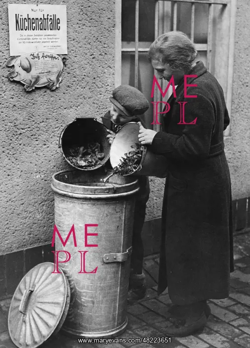 : Collecting kitchen waste for a piggery of the NSV in Ber : Collecting kitchen waste for a piggery of the NSV in Ber