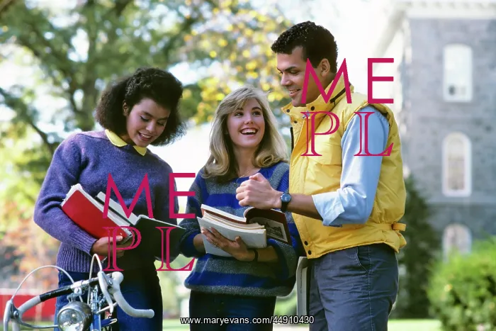 : Three College Students Comparing Notes on Campus : Three College Students Comparing Notes on Campus