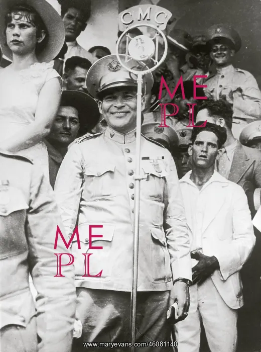 : Colonel Batista, delivering a speech : Colonel Batista, delivering a speech