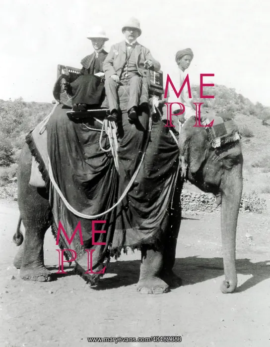  : Colonial India, British gents ride on an elephant