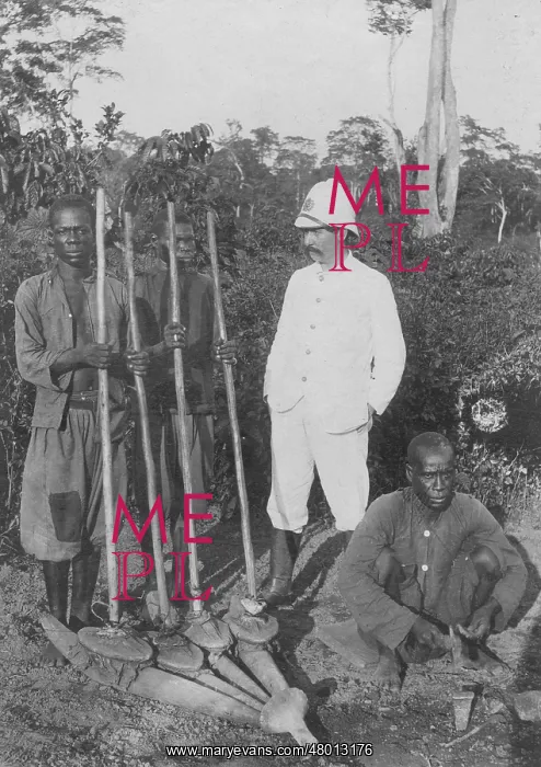  : Colonial official with blacks in the Belgian colony of Congo