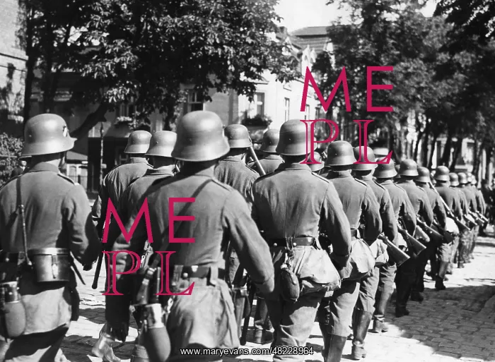 : Column of German soldiers in a garrison town : Column of German soldiers in a garrison town