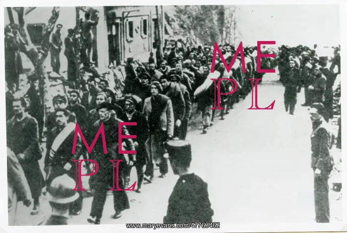  : Column of men being marched to French Internment Camps