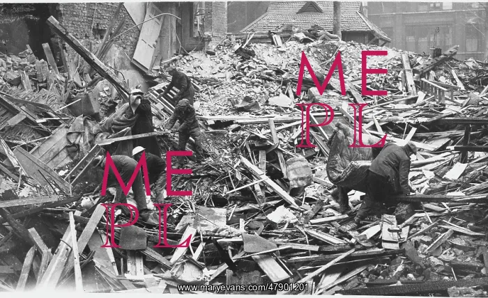 : Combing the wreckage of a bombed house : Combing the wreckage of a bombed house