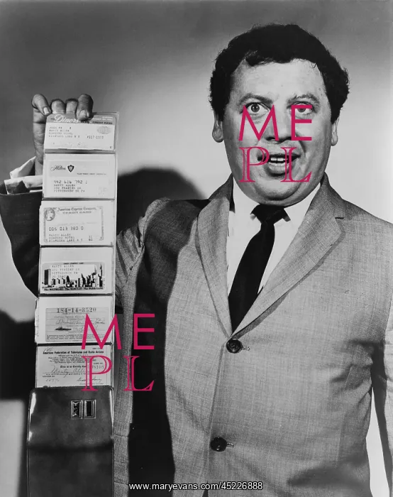 : Comedian Marty Allen, holding wallet with ? : Comedian Marty Allen, holding wallet with ?
