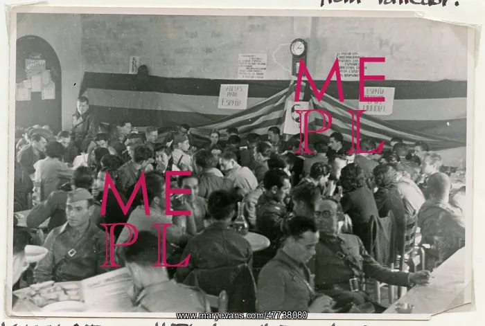 : Commissar Rogers of Mao Paps standing on the left : Commissar Rogers of Mao Paps standing on the left
