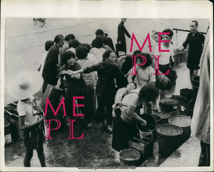 : China. Mar. 03, 1957 - Women fight at Hong Kong Water Rationing Point : China. Mar. 03, 1957 - Women fight at Hong Kong Water Rationing Point
