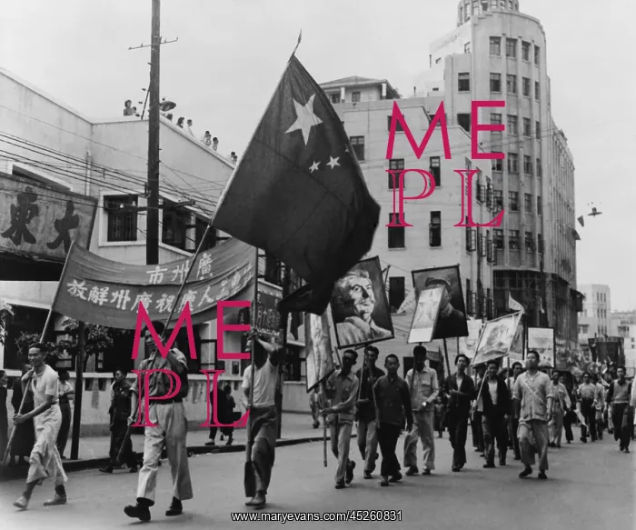 : Communist marchers parade along the Pearl River : Communist marchers parade along the Pearl River