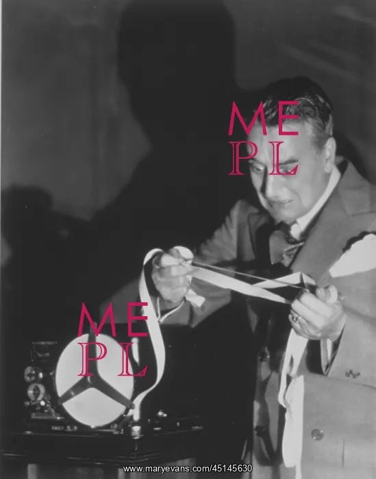 : Confused Man With Filmstrip : Confused Man With Filmstrip