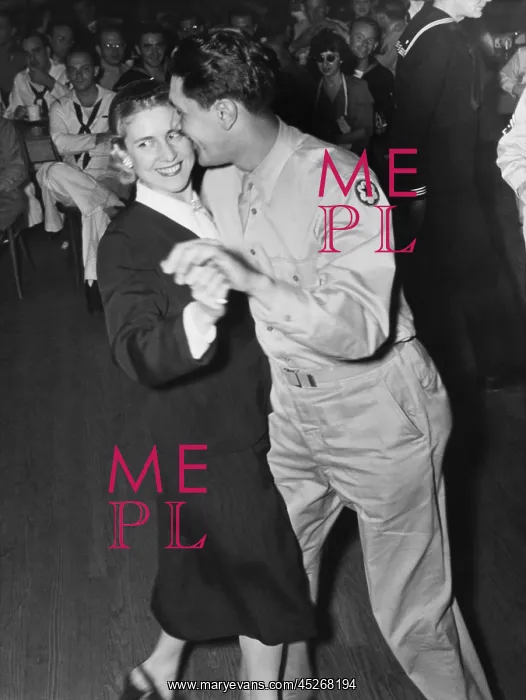 : Congresswoman Clare Boothe Luce dances with a G.I : Congresswoman Clare Boothe Luce dances with a G.I