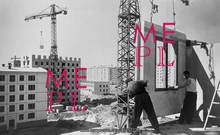 : Construction workers building an eighty unit apartment : Construction workers building an eighty unit apartment