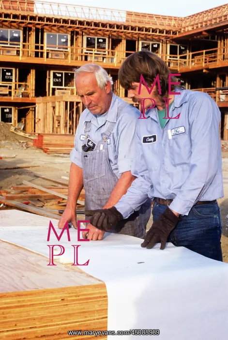 : Two Construction Workers Older and Younger Man : Two Construction Workers Older and Younger Man