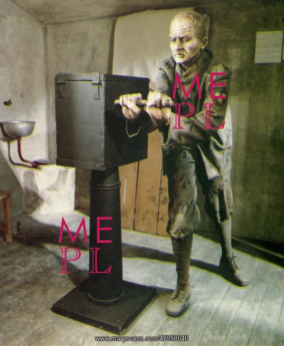: Convict in prison cell turning hand-crank : Convict in prison cell turning hand-crank