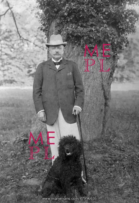 : Count Bernhard von Buelow poses with his poodle. The : Count Bernhard von Buelow poses with his poodle. The