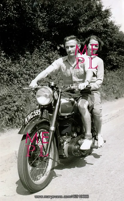 : Couple on a 152 BSA motorcycle : Couple on a 152 BSA motorcycle