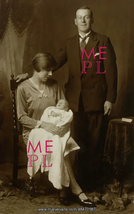 : A couple with their baby : A couple with their baby