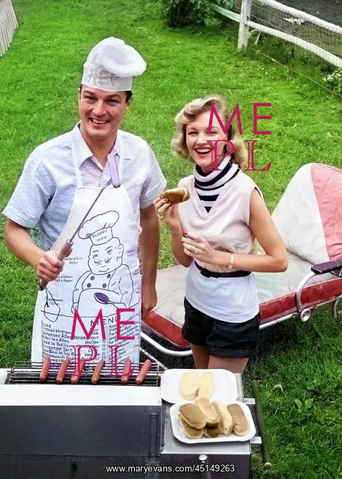 : Couple Backyard Grilling Looking at Camera Cooking : Couple Backyard Grilling Looking at Camera Cooking