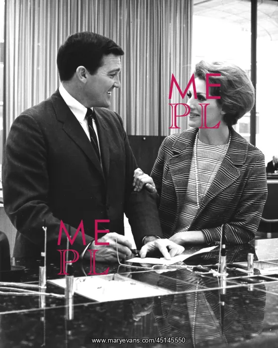 : Couple At a Bank Counter : Couple At a Bank Counter