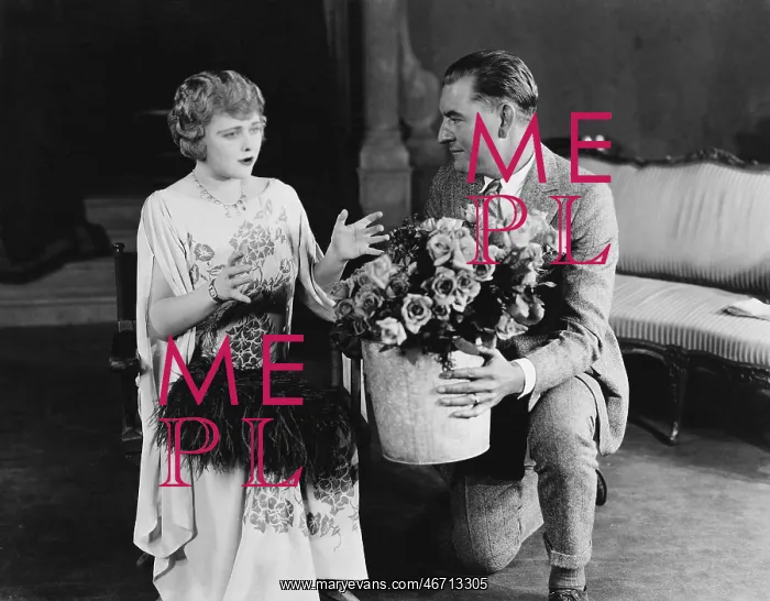 : Couple with bouquet of roses : Couple with bouquet of roses