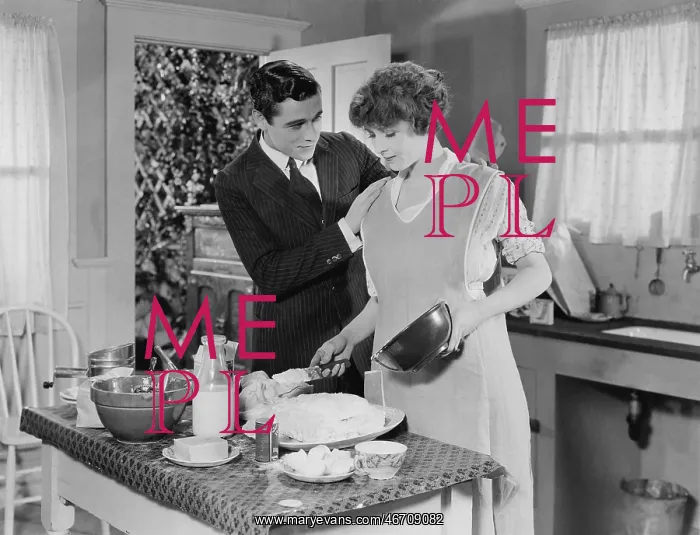 : Couple cooking in the kitchen : Couple cooking in the kitchen