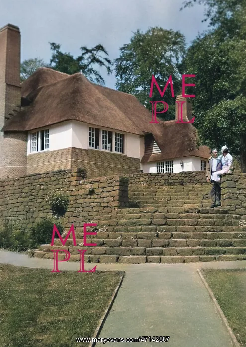 : Couple in cottage garden : Couple in cottage garden