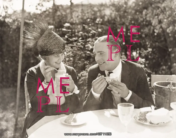 : Couple eating ice cream and cake : Couple eating ice cream and cake