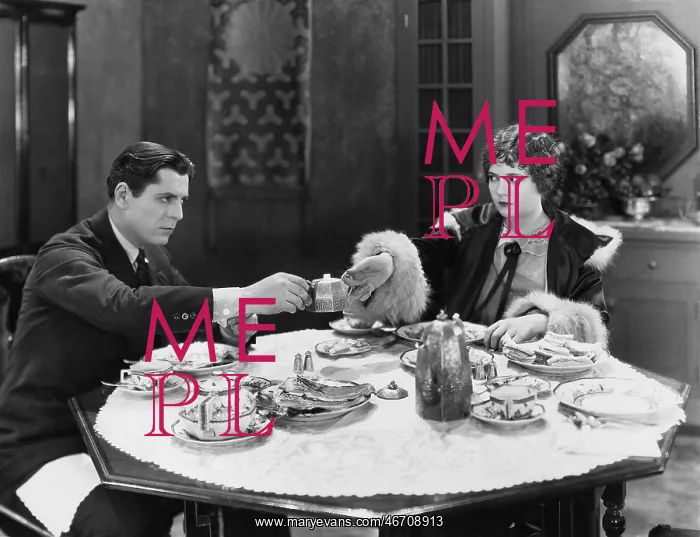 : Couple eating a meal together : Couple eating a meal together