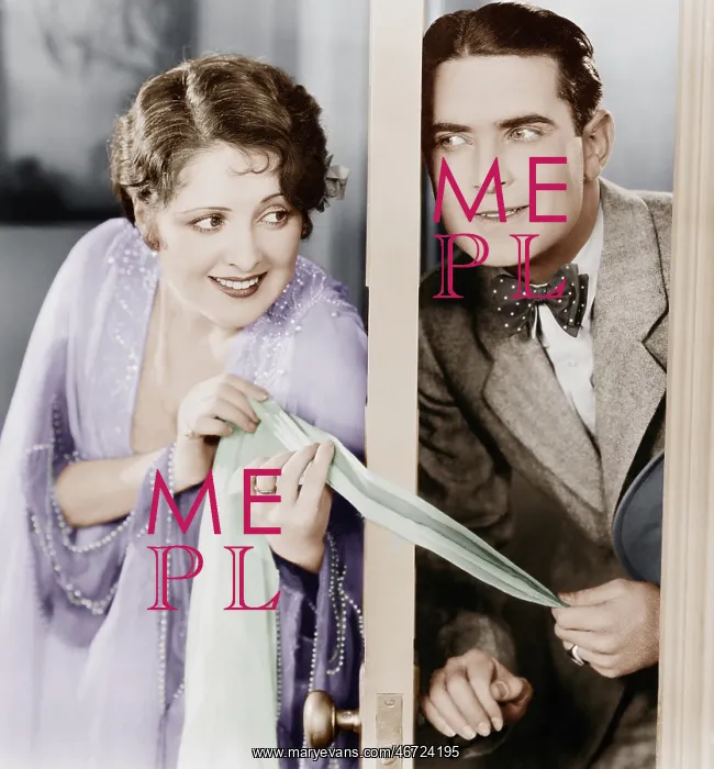 : Couple flirting through a slightly open door : Couple flirting through a slightly open door