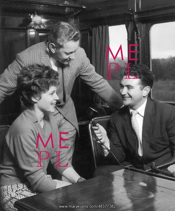 : Couple are Interviewed on a Train : Couple are Interviewed on a Train