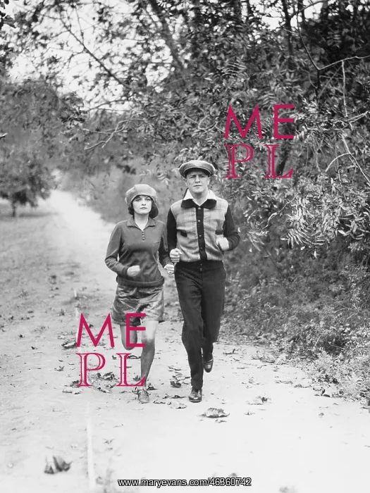 : Couple jogging through the country side : Couple jogging through the country side