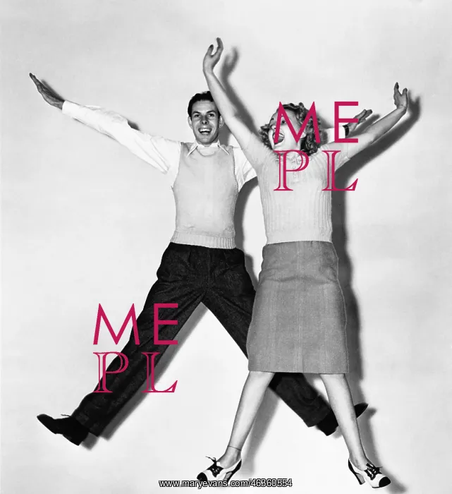 : Couple jumping with their arms outstretched : Couple jumping with their arms outstretched