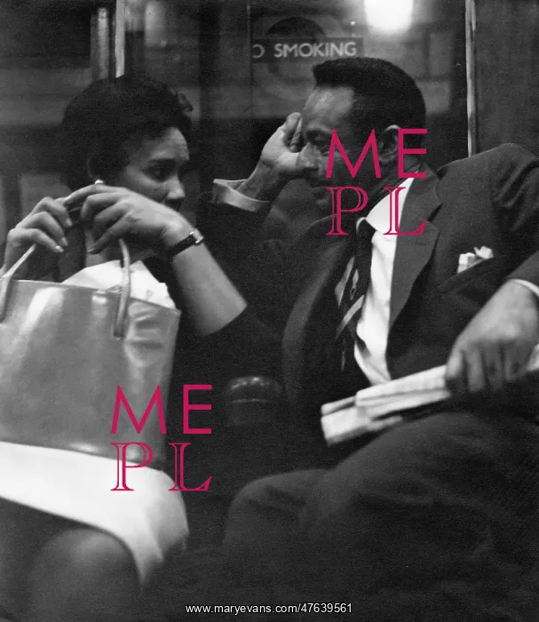 : Couple on a London underground train : Couple on a London underground train